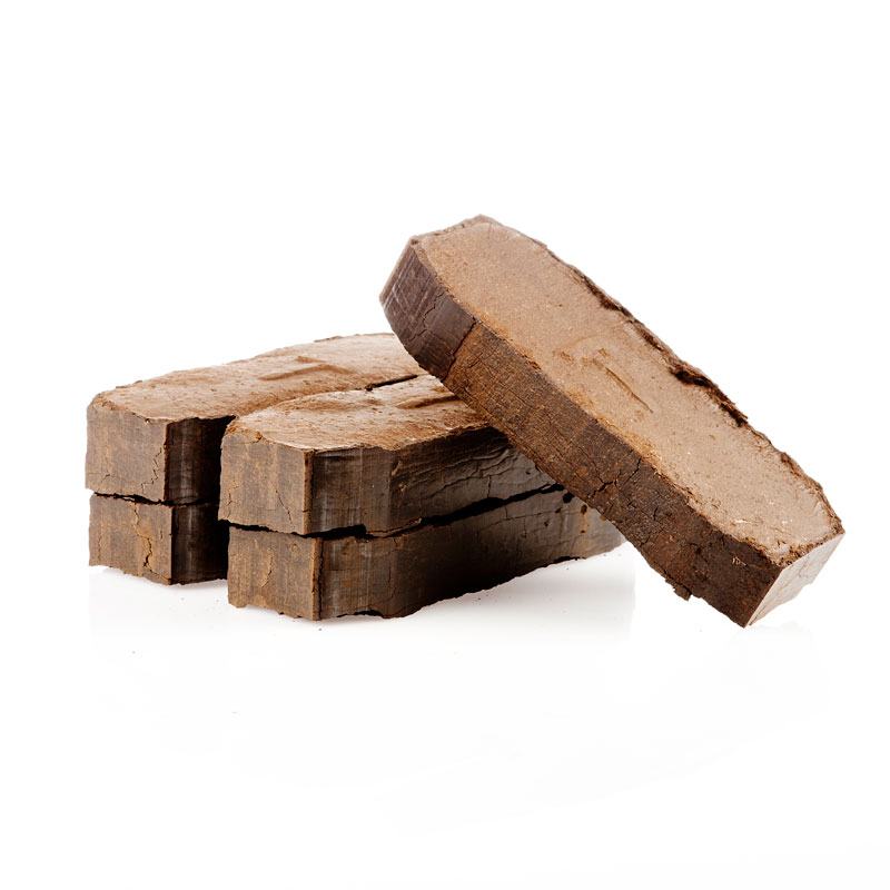 Blokke af brun halva dessert Stykker af brun halva stablet på hinanden